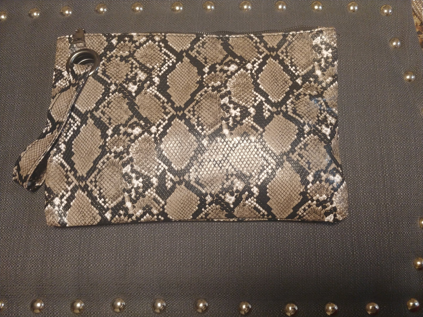 Snake print clutch