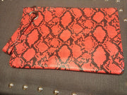 Snake print clutch
